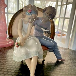 Lladro ‘A Poem for my Girl’ Rare porcelain sculpture, a couple on a garden bench